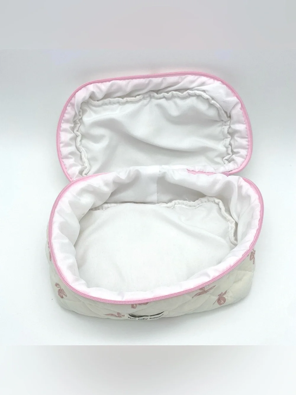 The Jolly House White Pink Bow Print Quilted Makeup Bag Zipper Handle